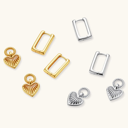 Platinum-plated 925 sterling silver rectangular hoop earrings with twisted ring connector and ribbed heart charm pendant.