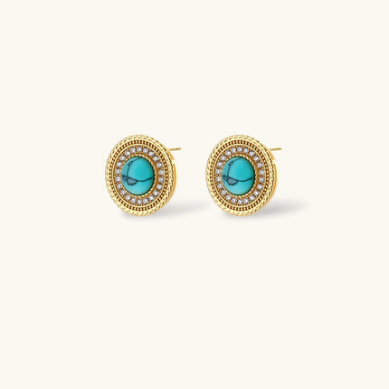 Gold-plated turquoise jewelry set with circular medallion pendant, beaded necklace, and matching stud earrings on white background
