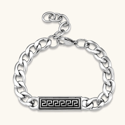 Silver 316L stainless steel curb chain bracelet with black Greek key meander rectangular ID plate, adjustable lobster clasp.