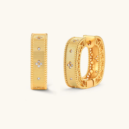 Square huggie hoop earrings in 18K gold-plated silver with ribbed texture, rope borders, floral CZ clusters, and filigree inner lace.